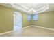 Bright and airy dining area featuring tile floors, an arched doorway, and plenty of natural light at 1330 16Th St, Sarasota, FL 34236