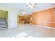 Spacious open-concept living space with tile flooring, ceiling fans, and natural light at 1330 16Th St, Sarasota, FL 34236