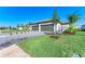 Beautiful single-Gathering home with lush landscaping and a paver driveway at 15507 Sunny Day Dr, Bradenton, FL 34211