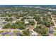 An aerial view showcasing the neighborhood's lush greenery and tranquil setting at 1631 Madison Ave, North Port, FL 34286