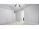 Bright bedroom with carpet, closet, and an en-suite bathroom at 1719 Kenilworth St, Sarasota, FL 34231