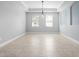 Bright dining area features neutral paint, recessed lighting, and large tile flooring at 1719 Kenilworth St, Sarasota, FL 34231