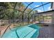 Gorgeous screened pool with spa and patio, great for relaxing and enjoying the outdoors at 1719 Kenilworth St, Sarasota, FL 34231