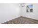 Bedroom with hardwood floors, natural light, and a clean, modern design at 221 Duxbury Ave, Port Charlotte, FL 33952