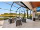 Open-air patio with outdoor seating and a tranquil lake view at 251 Dove Trl, Bradenton, FL 34212