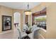 This breakfast nook has a view into the game room and overlooks the lanai at 251 Dove Trl, Bradenton, FL 34212