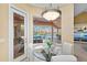 The breakfast nook has a window overlooking the pool and lanai at 251 Dove Trl, Bradenton, FL 34212