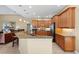 The kitchen features granite countertops, stainless appliances, and tile backsplash at 251 Dove Trl, Bradenton, FL 34212