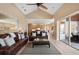 Bright living room with vaulted ceiling and views into the kitchen and lanai at 251 Dove Trl, Bradenton, FL 34212
