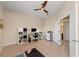 Bright office featuring a ceiling fan, desk, and shelving, ideal for working from home at 251 Dove Trl, Bradenton, FL 34212
