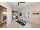 Bright workout space with tile flooring and sliding glass doors leading to a screened outdoor patio at 251 Dove Trl, Bradenton, FL 34212