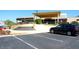 Attractive building featuring manicured landscaping, covered entrance, and plenty of parking at 2608 Waterford Way # B, Palmetto, FL 34221