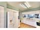The kitchen has lots of cabinet space and a view of the living room at 2608 Waterford Way # B, Palmetto, FL 34221