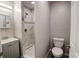 Updated bathroom with a tiled shower, new fixtures, and modern vanity with storage at 2722 Nancy St, Sarasota, FL 34237