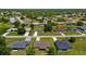 Expansive aerial view of the home in a desirable community with lush surroundings and well-maintained landscaping at 27255 Deep Creek Blvd, Punta Gorda, FL 33983