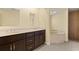Elegant bathroom featuring double vanities and luxurious soaking tub at 27255 Deep Creek Blvd, Punta Gorda, FL 33983
