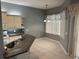 Bright kitchen with granite counters, stainless appliances, a breakfast nook, and tiled floors at 3312 92Nd E Ave, Parrish, FL 34219