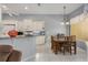 Inviting kitchen area adjacent to a cozy dining space with tile floors and lots of light at 3312 92Nd E Ave, Parrish, FL 34219