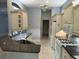 Well-equipped kitchen with granite countertops, stainless steel sink, and updated appliances at 3312 92Nd E Ave, Parrish, FL 34219