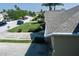 Street view of a home with manicured lawn and palm trees in a quiet neighborhood at 3312 92Nd E Ave, Parrish, FL 34219