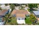 Aerial view of a charming home with a lush backyard, patio, and tasteful landscaping at 3417 50Th W St, Bradenton, FL 34209