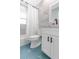 Well-lit bathroom with blue tile floors, shower, and modern vanity at 3417 50Th W St, Bradenton, FL 34209