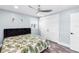 Cozy bedroom with modern fan, closet doors, and comfortable finishes at 3417 50Th W St, Bradenton, FL 34209