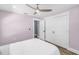 Comfortable bedroom featuring wood floors, closet, and ceiling fan at 3417 50Th W St, Bradenton, FL 34209