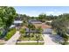 Charming home with lush tropical landscaping, large driveway, and attached two-car garage at 3417 50Th W St, Bradenton, FL 34209