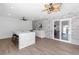 Bright kitchen with an island and views of the backyard through sliding glass doors at 3417 50Th W St, Bradenton, FL 34209