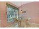 Breakfast nook features natural light from the large window at 3870 Alamanda Dr, Sarasota, FL 34238
