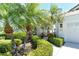 Charming single-Gathering home with landscaped front yard and a covered entry area, perfect for curb appeal at 3870 Alamanda Dr, Sarasota, FL 34238