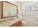 Bathroom with a walk-in shower, vanity and sink, and a toilet at 4668 Tuscana Dr, Sarasota, FL 34241