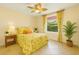 Cozy bedroom with a ceiling fan and window at 4668 Tuscana Dr, Sarasota, FL 34241