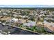 Aerial shot showcases waterfront homes along canals, highlighting the community's unique waterways and screened pools at 4715 Spinnaker Dr, Bradenton, FL 34208