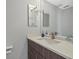 Neat and functional bathroom with a modern vanity and a sleek countertop at 4715 Spinnaker Dr, Bradenton, FL 34208