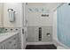 Charming bathroom featuring mosaic tile accents, coastal decor, and a refreshing ambiance at 4715 Spinnaker Dr, Bradenton, FL 34208