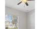 Bright bedroom boasts a ceiling fan, natural light through the window and neutral color at 4715 Spinnaker Dr, Bradenton, FL 34208