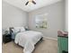 Comfortable bedroom featuring a ceiling fan and plenty of natural light at 4715 Spinnaker Dr, Bradenton, FL 34208