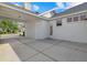 A spacious driveway provides ample parking space, complemented by the home's clean, white exterior at 4715 Spinnaker Dr, Bradenton, FL 34208