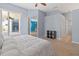 Bedroom featuring tile floors, neutral paint and access to ensuite bathroom at 4729 Peridia E Blvd, Bradenton, FL 34203