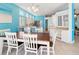 Open dining area with view into kitchen with white cabinetry at 4729 Peridia E Blvd, Bradenton, FL 34203