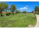 A lush golf course with manicured greens and pond views at 4729 Peridia E Blvd, Bradenton, FL 34203