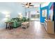 Inviting living room with views of the pool and outdoor area at 4729 Peridia E Blvd, Bradenton, FL 34203