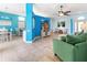 Open-concept living space with dining area, kitchen, and living room at 4729 Peridia E Blvd, Bradenton, FL 34203