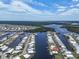 Aerial view of the community surrounded by canals and waterfront properties at 517 Tampico Dr, North Port, FL 34287