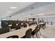 Spacious event hall is ready to host gatherings, with tables, chairs, and a bright, airy feel at 517 Tampico Dr, North Port, FL 34287