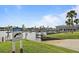 Community marina includes docks and signage encouraging safety and awareness of local wildlife at 517 Tampico Dr, North Port, FL 34287