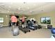 Well-equipped fitness center with treadmills and stationary bike, offering a great workout space at 5230 Landings Blvd # 101, Sarasota, FL 34231