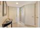Welcoming foyer with neutral tones, tile floors, and ample closet space at 5230 Landings Blvd # 101, Sarasota, FL 34231